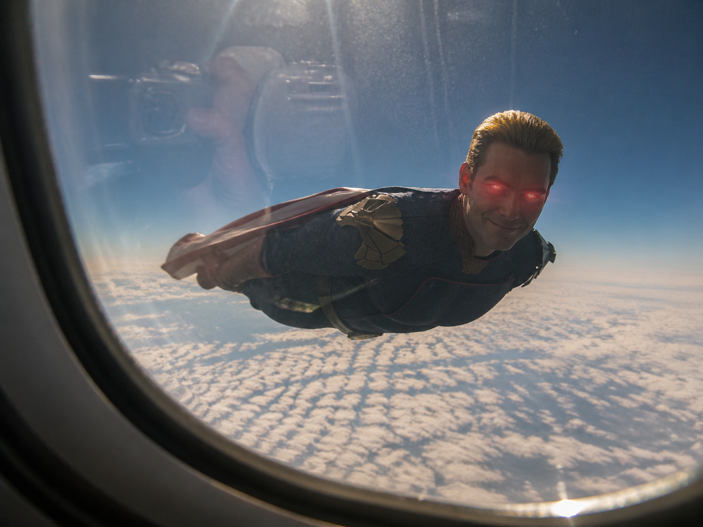 POV perspective, looking out from a passenger plane window, Homelander from The Boys is in the distance…