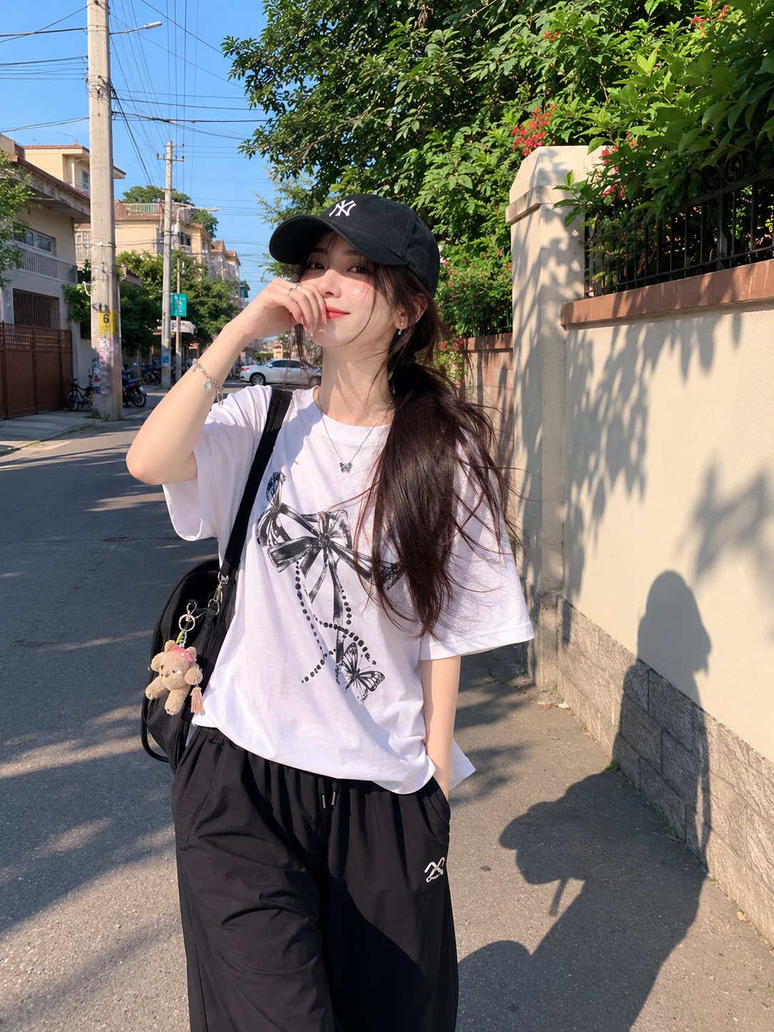 Japanese girl in black baseball cap afternoon walk in residential area